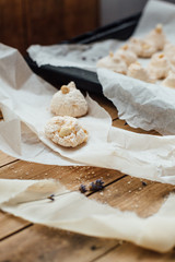 Baking tray with delicious coconut macaroons. Closeup