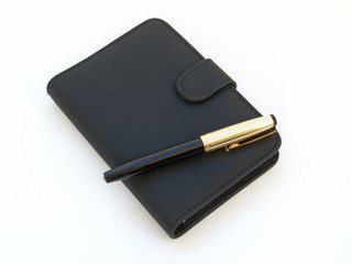 Stift auf einer Arbeitsmappe 