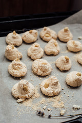 Baking tray with delicious coconut macaroons. Closeup