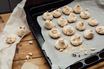 Baking tray with delicious coconut macaroons. Closeup