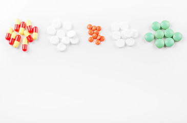Tablets and vitamins. Copy space. The concept of medicine, disease, health.