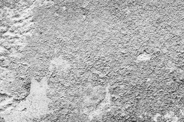 Wall fragment with scratches and cracks