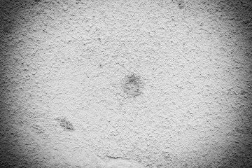 Wall fragment with scratches and cracks