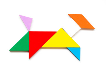Color wood tangram puzzle in goat shape on white background