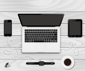 Smartphone, tablet pc and smartwatch connected to laptop computer © fad82