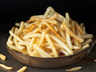 pan of rustic golden french fries