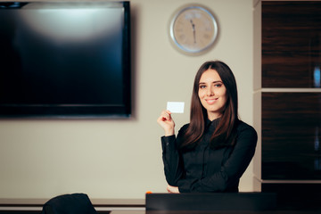 Receptionist Woman in front of Her Desk Greeting Customers