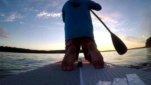 4K. On sup at sunset