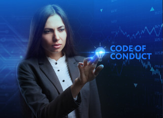 The concept of business, technology, the Internet and the network. A young entrepreneur working on a virtual screen of the future and sees the inscription: Code of conduct