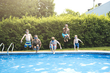 Children in outside swimming pool