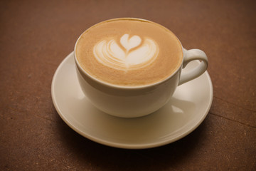 Hot coffee cafe latte on wood table
