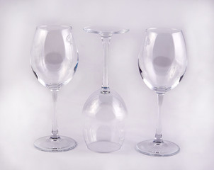 three empty glass glasses