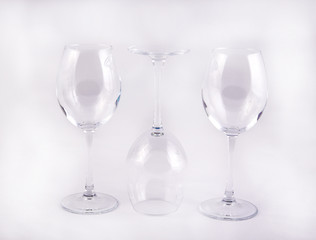 three empty glass glasses