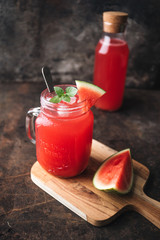 Refreshing cold summer drink watermelon juice with basil