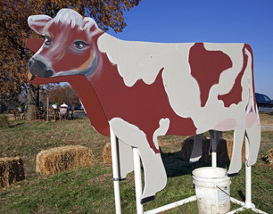 Wooden model cow for milking demonstration. Moo....