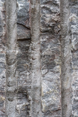 Gray surface of marble stone with striped streaks.