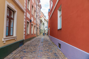 Narrow medieval street in Old City, Riga, Latvia