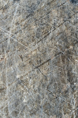 Gray surface of marble stone with striped streaks.