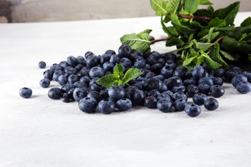 Blueberries  on a rustic table, Healthy eating and nutrition concept.