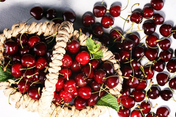 Cherry.A bunch of red fresh cherries on the table.