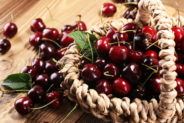 Cherry.A bunch of red fresh cherries on the table.