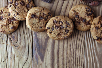 Chocolate cookies on table. Chocolate chip cookies shot with chocolate
