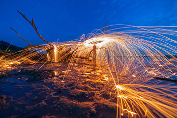 Fire steel wool long exposure with beautiful landscape