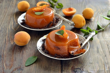 Apricot panna cotta with chocolate shavings and mint