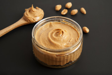 Peanuts and Fresh Peanut Butter Isoalted Black Background Protein Super Food Snack