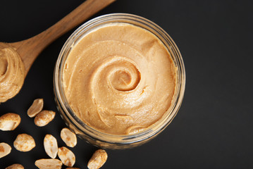 Peanuts and Fresh Peanut Butter Isoalted Black Background Protein Super Food Snack