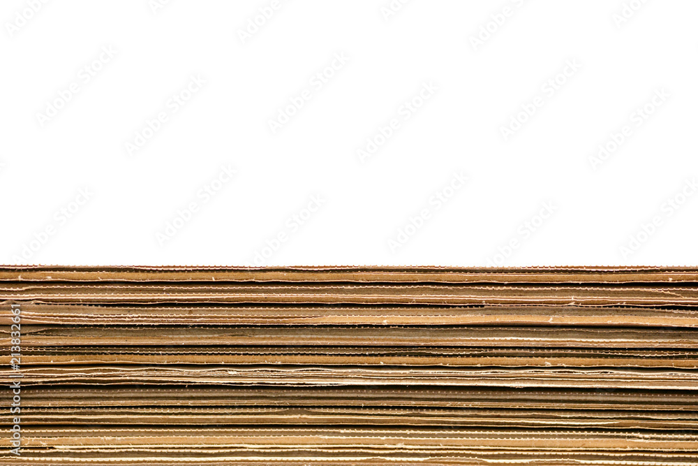 Poster Stack of corrugated cardboard boxes on white background with copy space