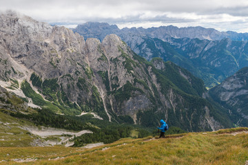 Fototapeta na wymiar Lonely tourist in the Julian Alps, Slovenia
