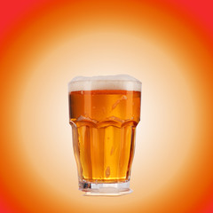 a glass of beer with foam