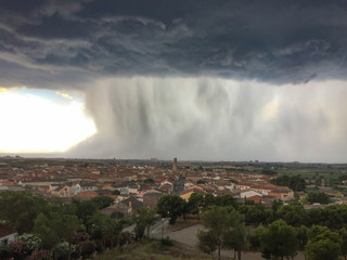 Zaragoza, Aragon, Spain July 11 2018, a huge waterfall storm is taking over the city of Zaragoza. View from Villamayor village