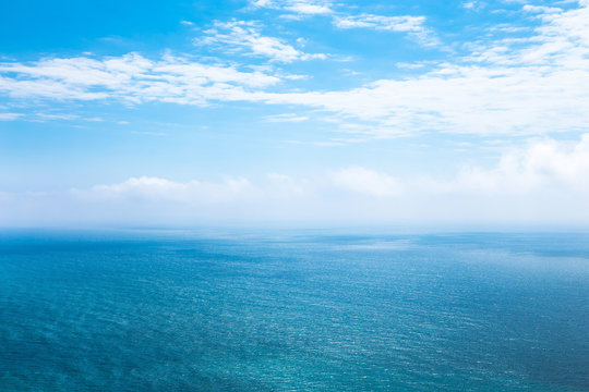 Fototapeta Beautiful seascape in the Atlantic ocean. Beautiful seascape with small waves on the water and amazing clouds in the sky