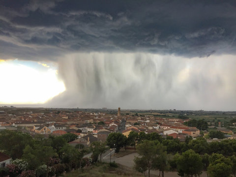 Zaragoza, Aragon, Spain July 11 2018, a huge waterfall storm is taking over the city of Zaragoza. View from Villamayor village