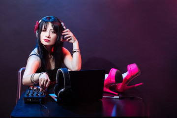 Portrait dj headphone plays equipment disco girl party retro vintage pink red desk mixer shoes...