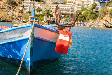 Fishing boat in the harbor of the Mediterranean close-up. Greece, Crete, Bali.