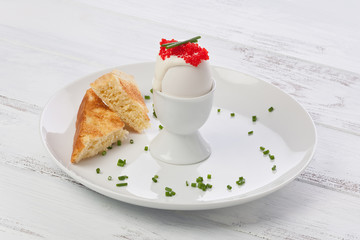 Boiled egg with Creme Fraiche and Roe
