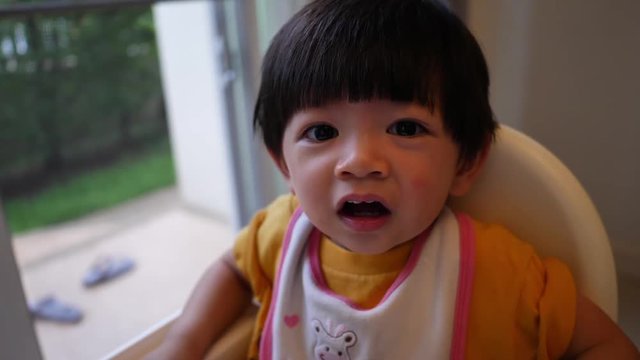 slow motion cute child face stunning shock