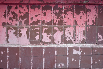 shabby old red wall of tiles