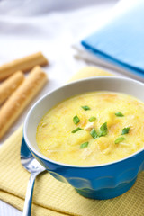 Cheese soup with chicken, potatoes and turmeric