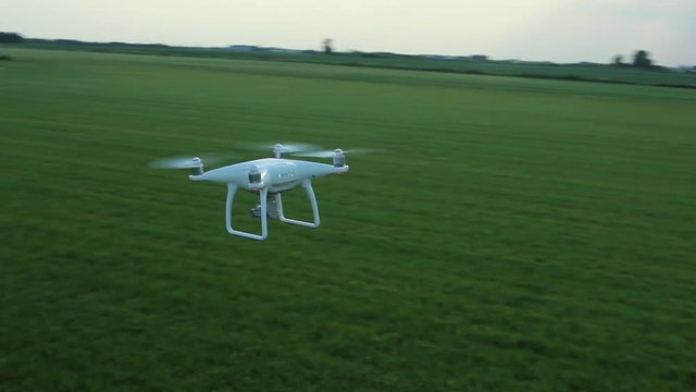 View Of Drone Hovering In The Field
