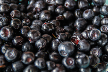 Flatlay with raspberries, blueberries and gooseberries.