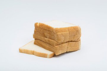 cutting wheat bread  isolated on a white background