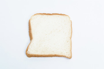 Fototapeta na wymiar cutting wheat bread isolated on a white background