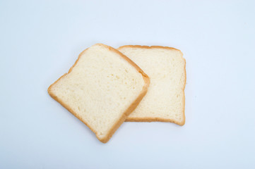 Fototapeta na wymiar cutting wheat bread isolated on a white background