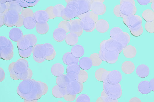 Pink confetti on blue background.