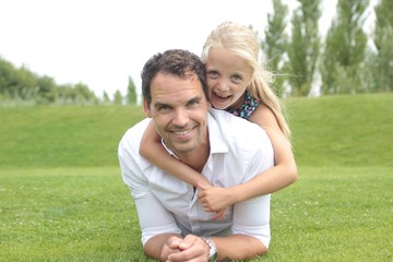 Obraz premium Father and daughter outside
