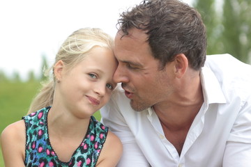 Father and daughter outside